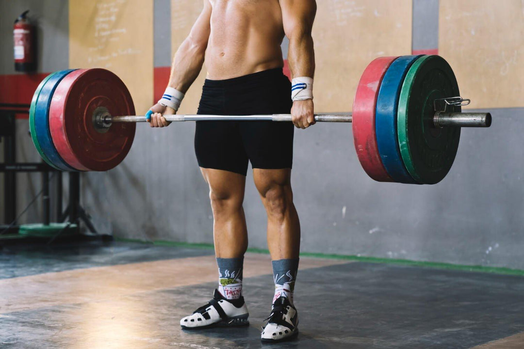 A Beginner's Guide to Buying an Olympic Barbell - PRO WOLF